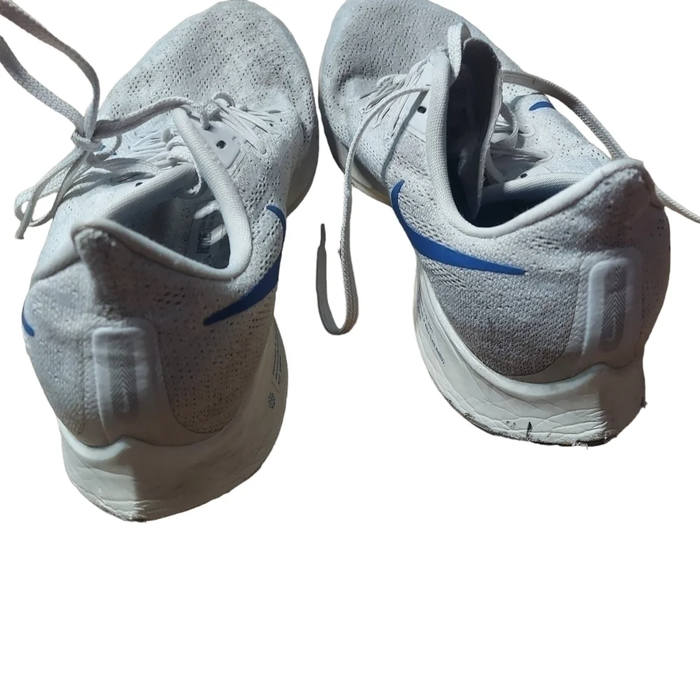 11 Nike Zoom white‎ and blue sneakers